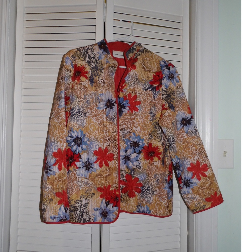 A classic and chic, floral cover/ suit jacket